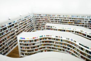 White curved bookshelves.